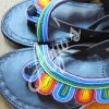 and glamour come together with these chic sandals. Inspired by the Giriama tribe in Kenya